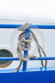 Rope on a blue reling