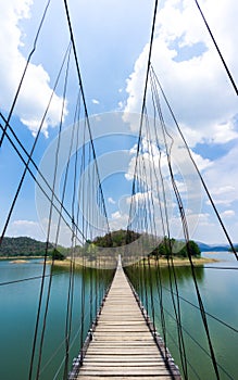 Rope bridge to island and sky