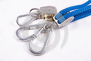 Rope, carabiner and sailing pulley. Accessories used on a deep sea yacht