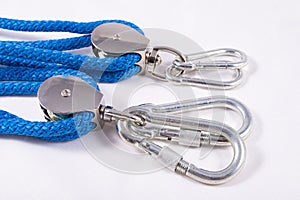 Rope, carabiner and sailing pulley. Accessories used on a deep sea yacht