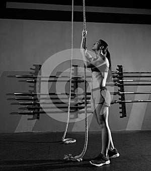 Rope Climb exercise woman workout at gym