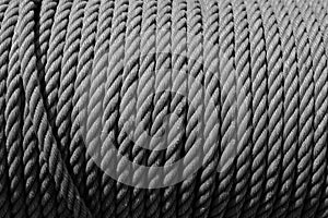 Rope coil. Black and white background. b&w texture abstract