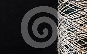 Rope coil on dark background