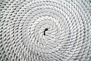 Rope coiled on dock