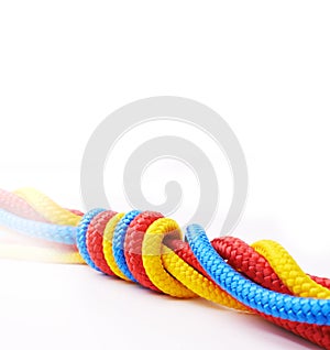 Rope, color and knot together by white background for support with strong connection, collaboration and helping. String
