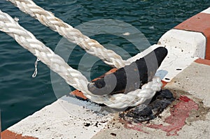 Rope dock and tied to a old metal cleat.