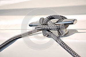 Rope fasten on stake of yacht