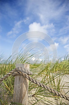 Rope fence on beach.