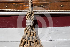 Rope fender on a wooden tall ship