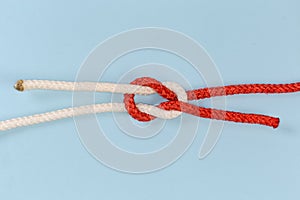 Rope grief knot on a blue background
