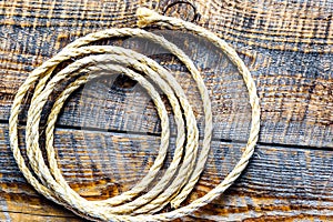 rope gyrate on a wooden table photo