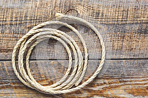 Rope gyrate on a wooden table photo