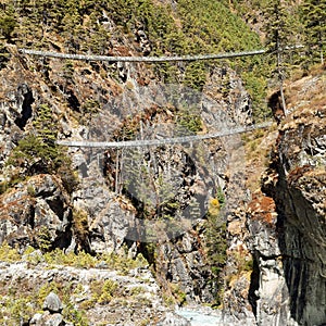 Rope hanging suspension bridges in Nepal Himalayas