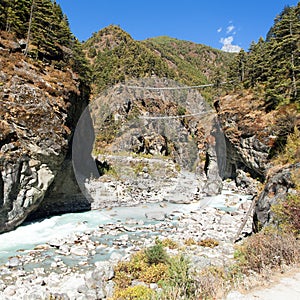 Rope hanging suspension bridges in Nepal Himalayas