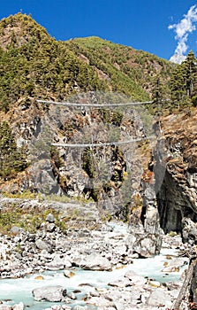 Rope hanging suspension bridges in Nepal Himalayas