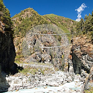 Rope hanging suspension bridges in Nepal Himalayas