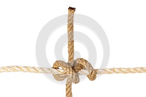 Rope isolated. Closeup of figure rolling hitch node or knot from a brown rope isolated on a white background. Navy and marine knot