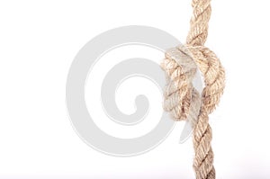 Rope knot as a strong nautical marine line tied together as a symbol for trust and strenght