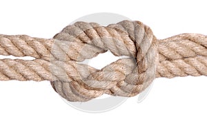 Rope knot isolated over white photo