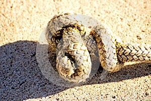 Rope with knot on a pier floor