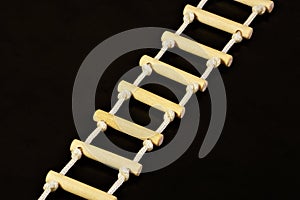 Rope ladder. on a black background. Simple and reliable inventory