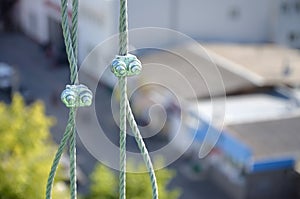 Rope lockers in of suspended wire rope platform for facade works on high multistorey buildings. Rope lockers blocks kink for