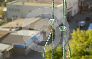 Rope lockers in of suspended wire rope platform for facade works on high multistorey buildings. Rope lockers blocks kink