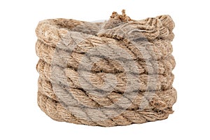 Rope made of jute in loops and knots on a white background. Linen twisted rope isolate