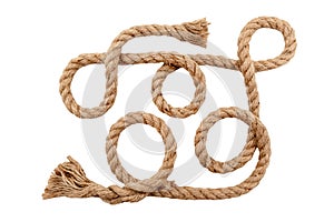 Rope made of jute in loops and knots on a white background. Linen twisted rope isolate