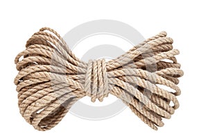 Rope made of natural jute on a white wooden background. Isolated