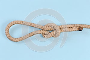 Rope Noose knot on a blue background