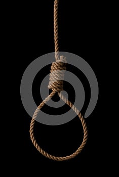 Rope noose with tight hangman knot isolated on black