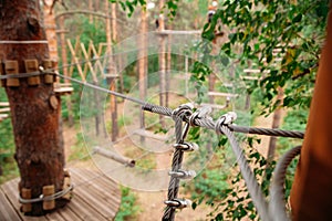 Rope park. System for attaching cables to trees close-up.