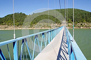 Rope pedestrian bridge on Kardzhali dam, Bulgaria