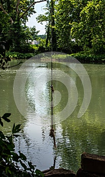 Rope swing over the waters