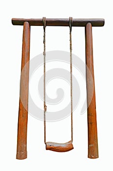 Rope swing with wooden seat on heartwood poles