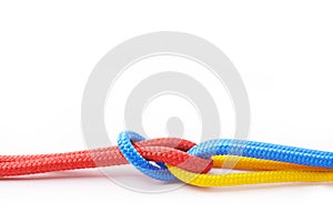 Rope, teamwork and collaboration in white studio background for abstract, knot or connection. Security, cables or