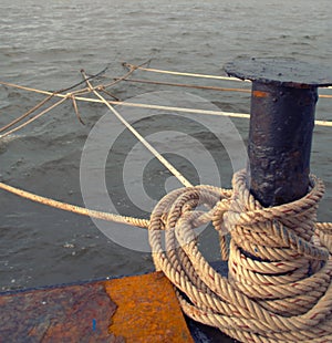 Rope ties on a dock. Detail close up.
