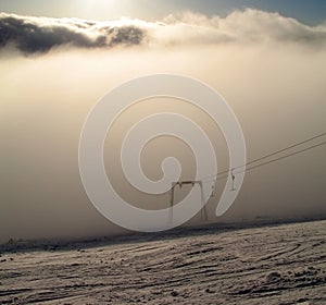 Rope tow in fog