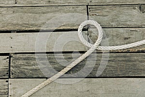 Rope on a wooden background