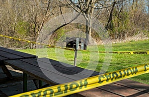 Roped-off tables and grill during COVID-19 photo