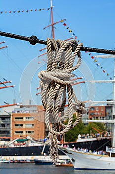 Ropes hanging from a cable.