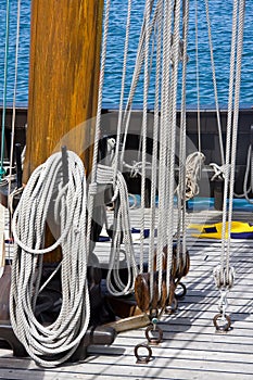 Ropes and pulleys on deck of ship