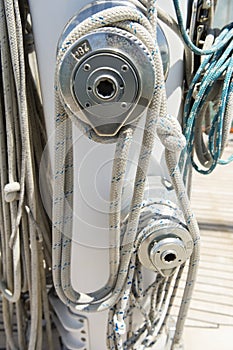 Ropes wound around winches on sailboat