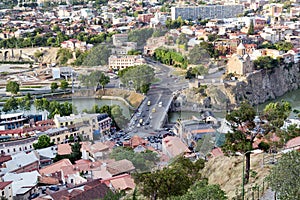 Ropeway cabins and a bridge across the river Mtkvari in Tbilisi. Republic Georgia