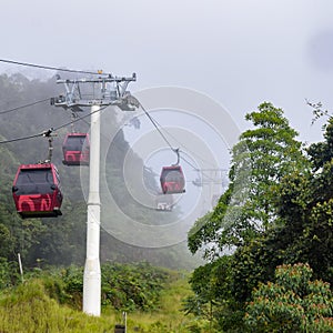 In a ropeway cable car going up from kualampur to genting highlands, Sky view and chin swee caves temple on skyway cable car, ge