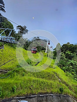 In a ropeway cable car going up from kualampur to genting highlands, Sky view and chin swee caves temple on skyway cable car, gent