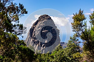 Roque Agando - Scenic view on massive volcanic rock formation Roque de Agando in Garajonay National Park on La Gomera