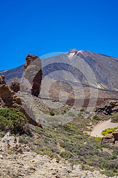 Roque Cinchado rock formation in front of Teide volcano