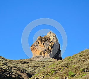 Roque Saucillo on intense blue sky, Gran canaria island photo